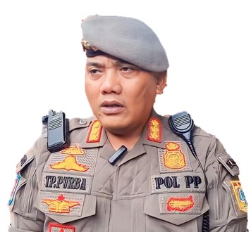 TUMBUR PARLUHUTAN, S.H., M.H.